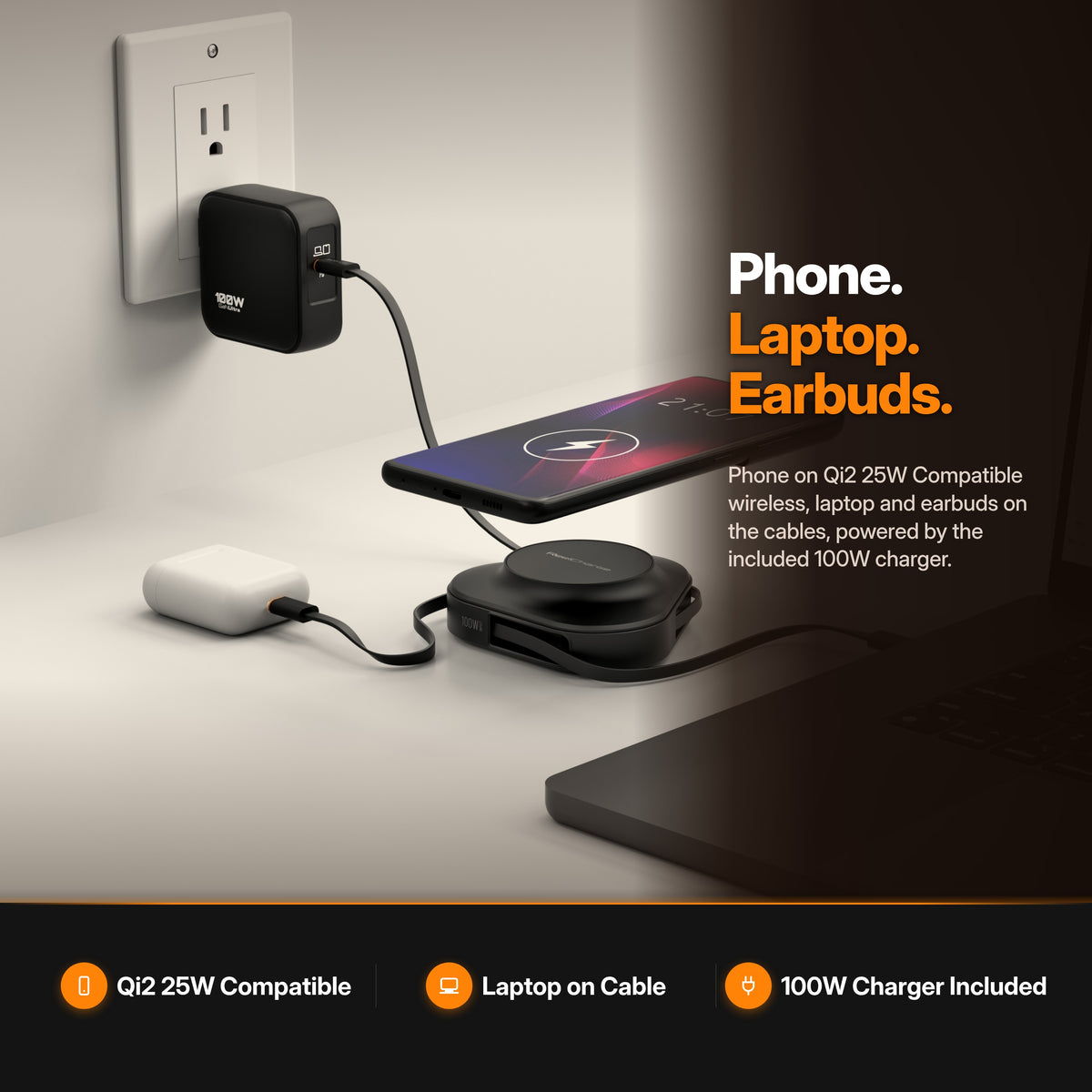 ReelCharge 3-in-1 Wireless Charger 100W PowerStation in Black: lifestyle scene charging a phone, earbuds and laptop on a desk