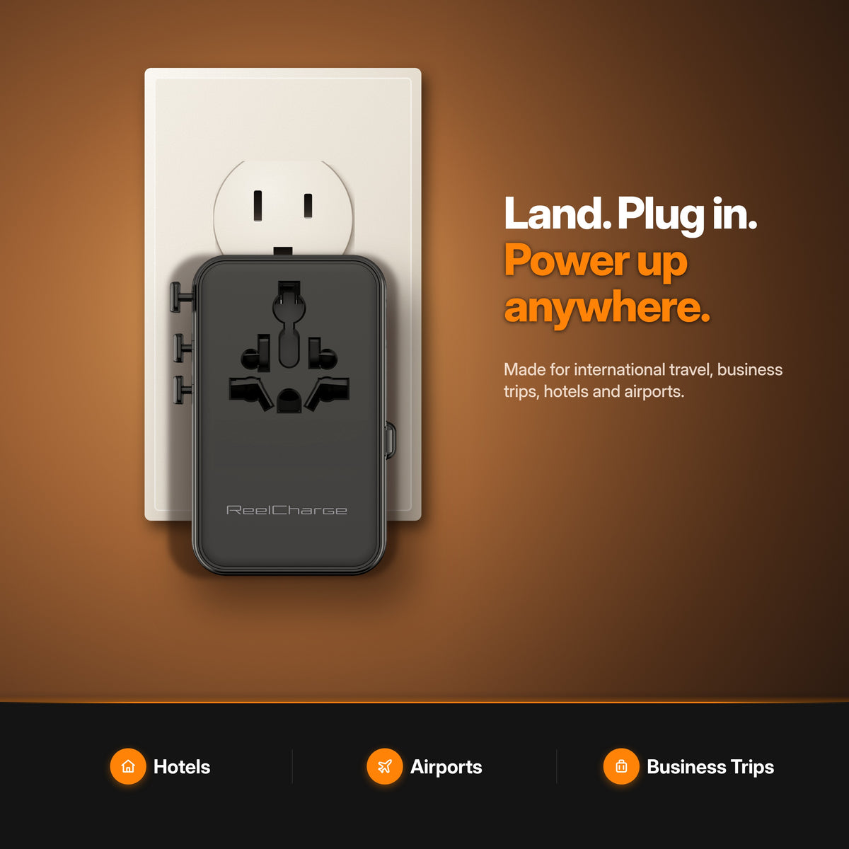 ReelCharge 70W Global Travel Charger plugged into a US wall outlet — land, plug in, power up anywhere