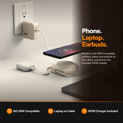 ReelCharge 3-in-1 Wireless Charger 100W PowerStation in Sand: lifestyle scene charging a phone, earbuds and laptop on a desk