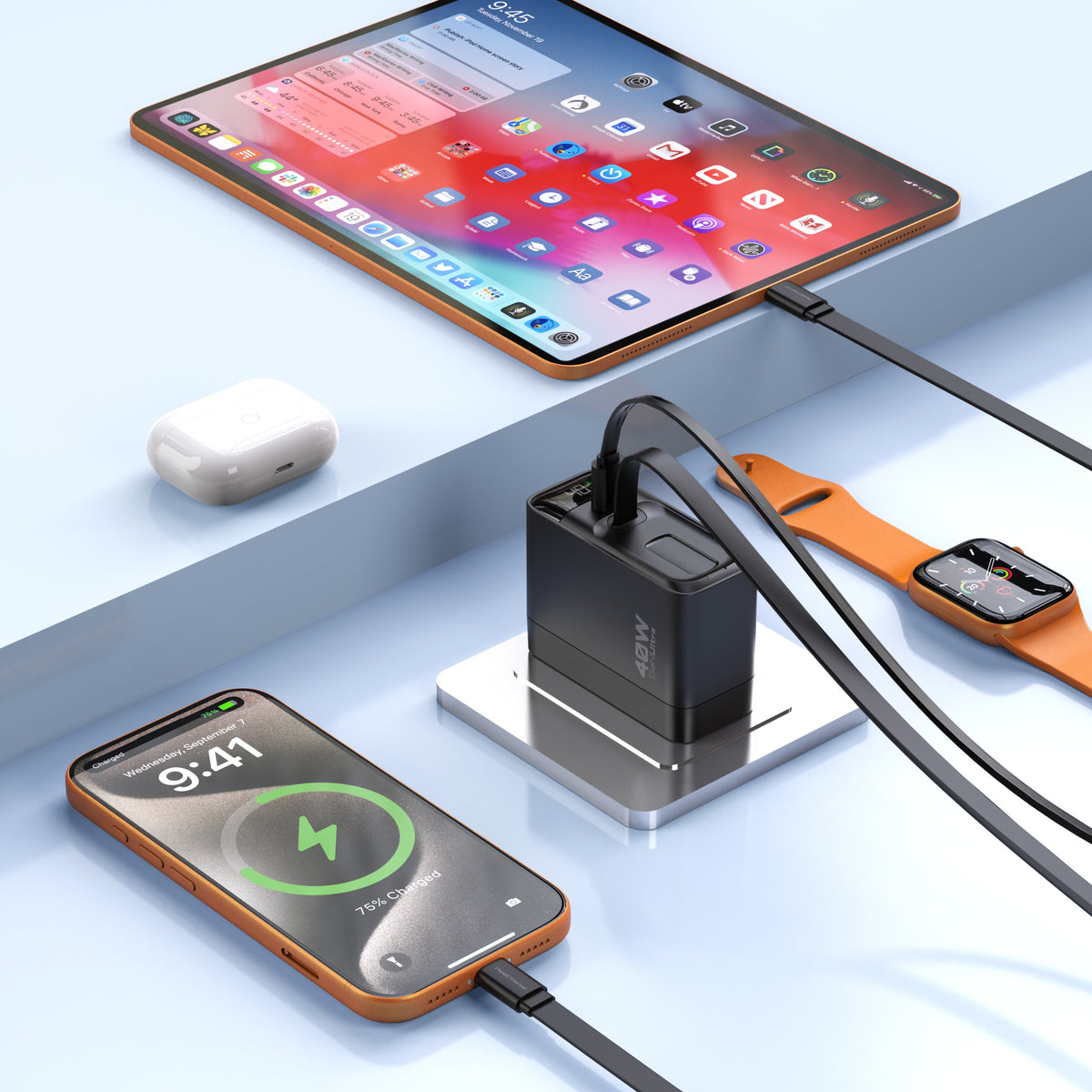 ReelCharge 40W 2-in-1 Wall Charger charging a phone and tablet on a desk