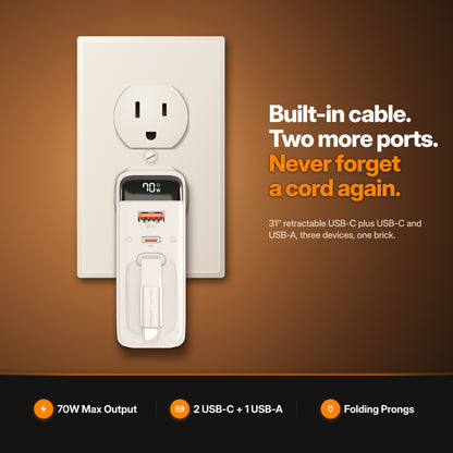 ReelCharge 70W 3-in-1 Wall Charger in White plugged into a US wall outlet — built-in cable, two more ports, never forget a cord again