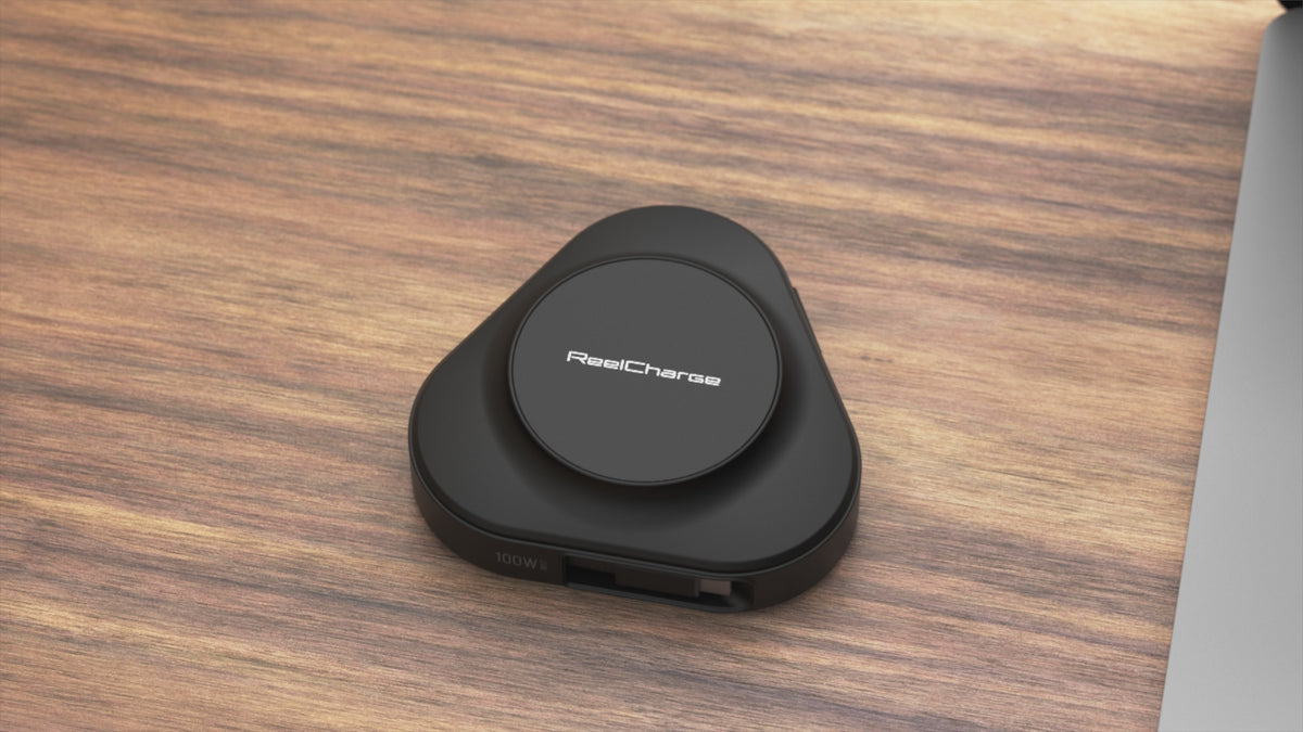 ReelCharge 100W 3-in-1 Wireless Charger PowerStation in Black: product animation charging a laptop, earbuds and phone